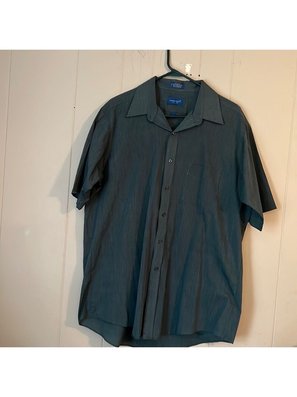 A man green dress shirt